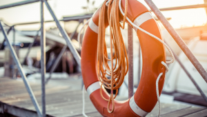 A life preserver on a boat gangplank
