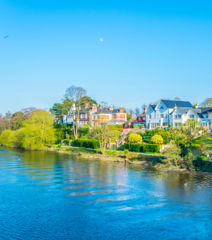 A sunlit town on a beautiful river