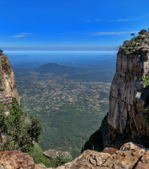 A valley between two plateaus, with a blue sky