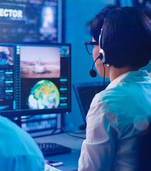 Mission control specialists monitoring a space flight